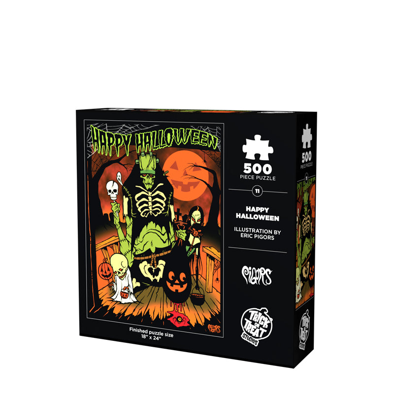 Product packaging back. Illustration, orange, green, black and white scene. Green frankenstein-like creature, vampire woman holding a black cat, and a skeleton wearing a white shroud, standing on a porch trick or treating.  Black bare trees and an orange Jack o'lantern face moon in the background.  Green text at top reads Happy Halloween.  White text reads 500 piece puzzle, Happy Halloween, Illustration by Eric Pigors. White Trick or Treat Studios logo. finished puzzle size 18 inches by 24 inches