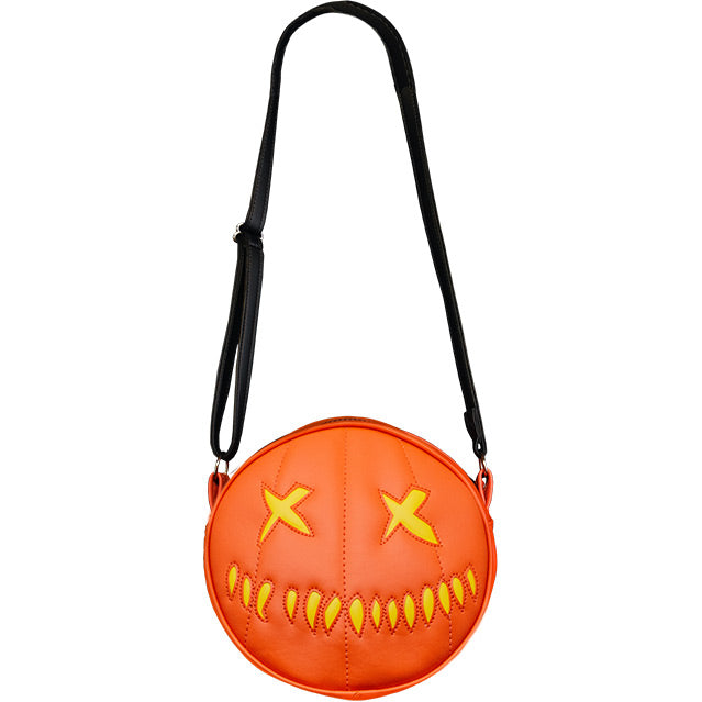 Bag. Front view. Round orange and yellow, jack o' lantern face. Two yellow x eyes, several straight yellow hash marks for mouth. Black adjustable strap.