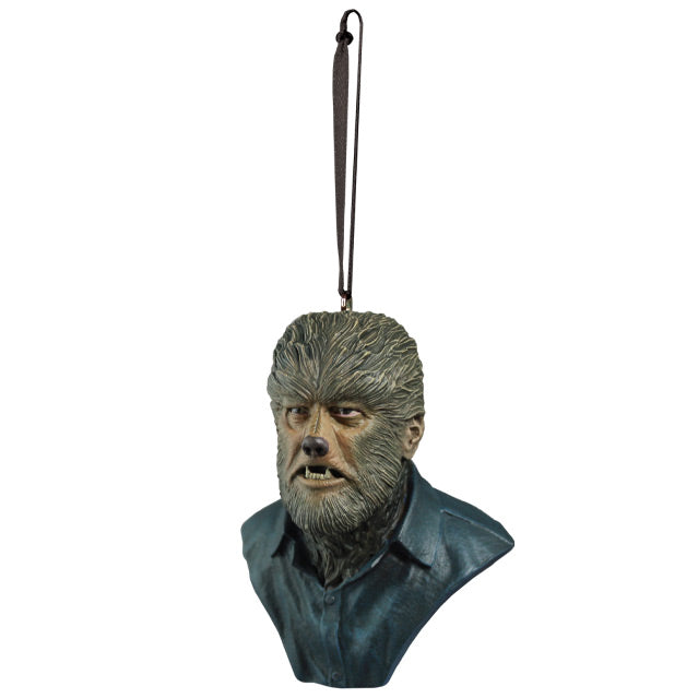 Ornament, left side view. Wolfman bust, head, shoulders and upper chest. Wolfman face covered in brown fur, with canine-like nose and mouth, wearing dark collared shirt.