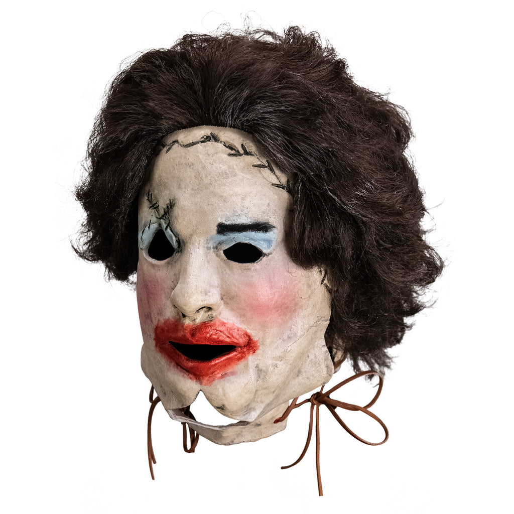 Leatherface latex mask with hair and leather thread details, side view