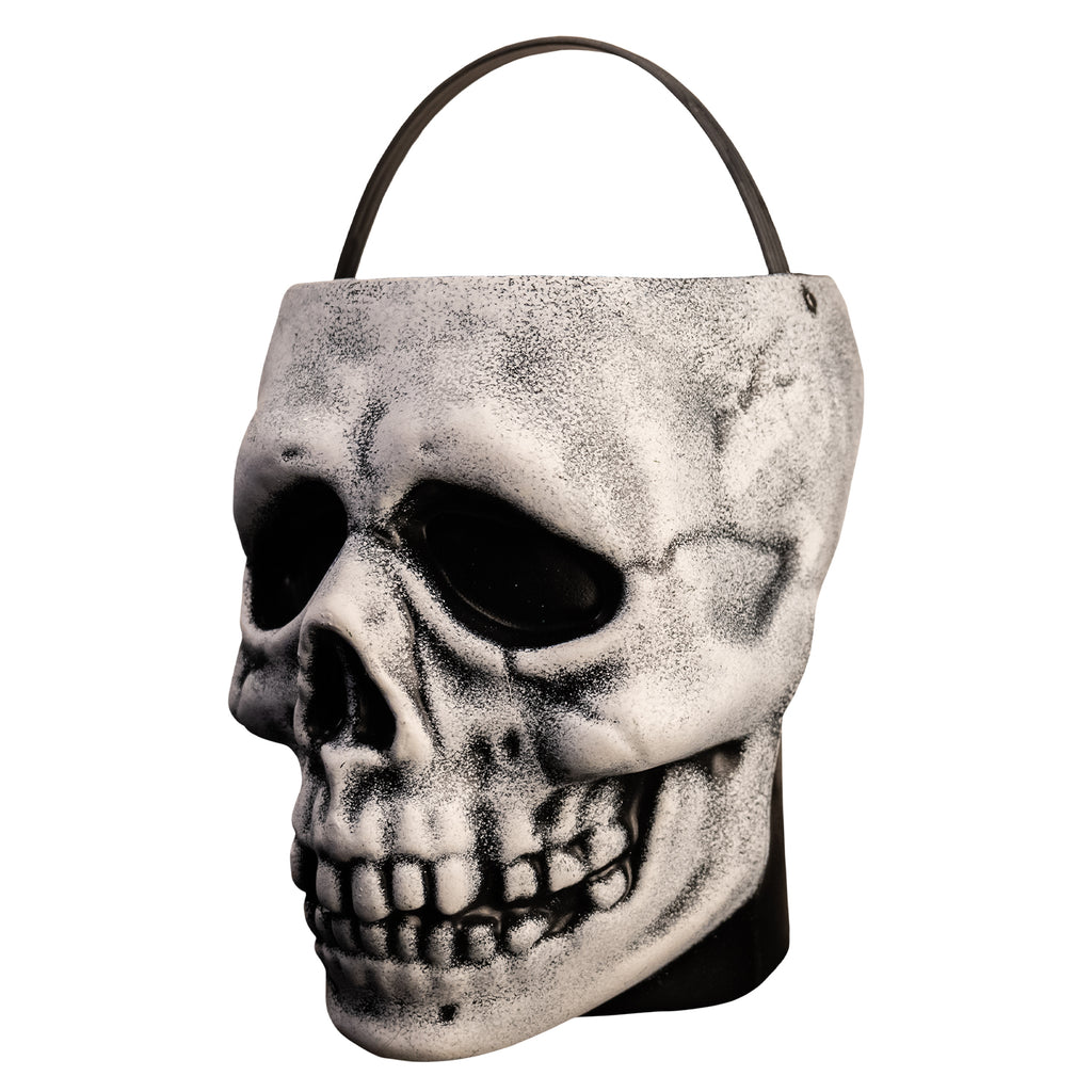 left view skull candy pail. White skull face. black and gray shading. Black handle at top.