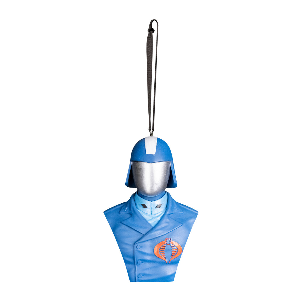 ornament, front view.  Bust of Cobra Commander, head shoulders and chest.  Wearing blue helmet with wide silver stripe in the center, silver face shield.  blue asymetrical buttoned uniform jacket with red cobra emblem on left breast, light blue high-collared shirt underneath.  Black cord at top for hanging.