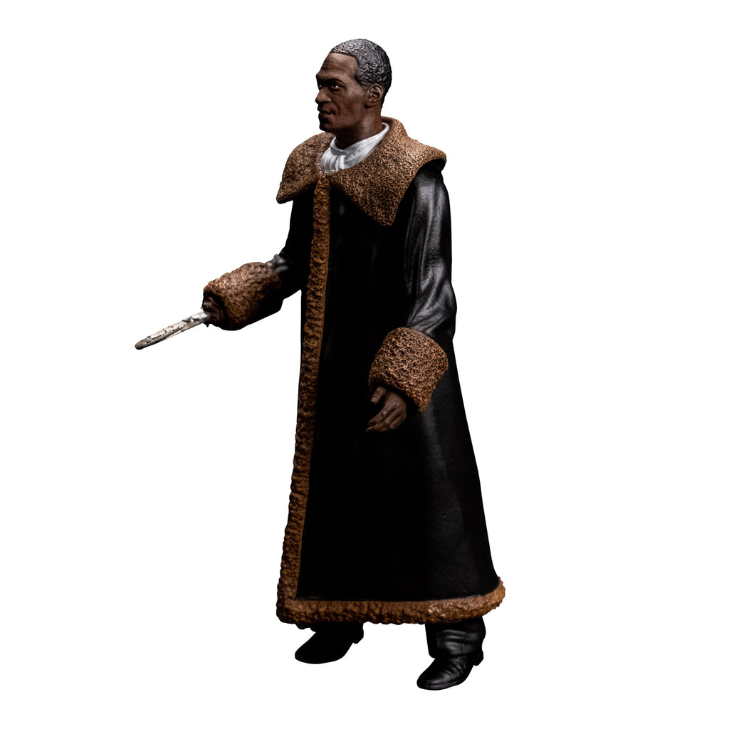 Candyman figure left side view. Man short brown hair, brown skin. wearing a white shirt under a full-length black leather coat with tan fur-trimmed large collar and cuffs. black boots and a hook for his right hand.