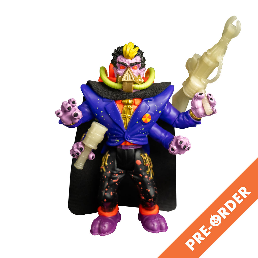 White background, orange diagonal banner bottom right, white text reads pre-order. Action figure, front view. black hair, yellow stripe in the center front. Pale purple flesh. Black eyebrows, red eyes. gold mask, triangular over nose and mouth, horizontal bands around lower jaw, yellow hoses on sides attached to orange backpack. Wearing orange shirt, gold tie, blue jacket, four arms, black cape, black pants with orange splatter, purple and orange shoes. Holding accessory weapons in two hands