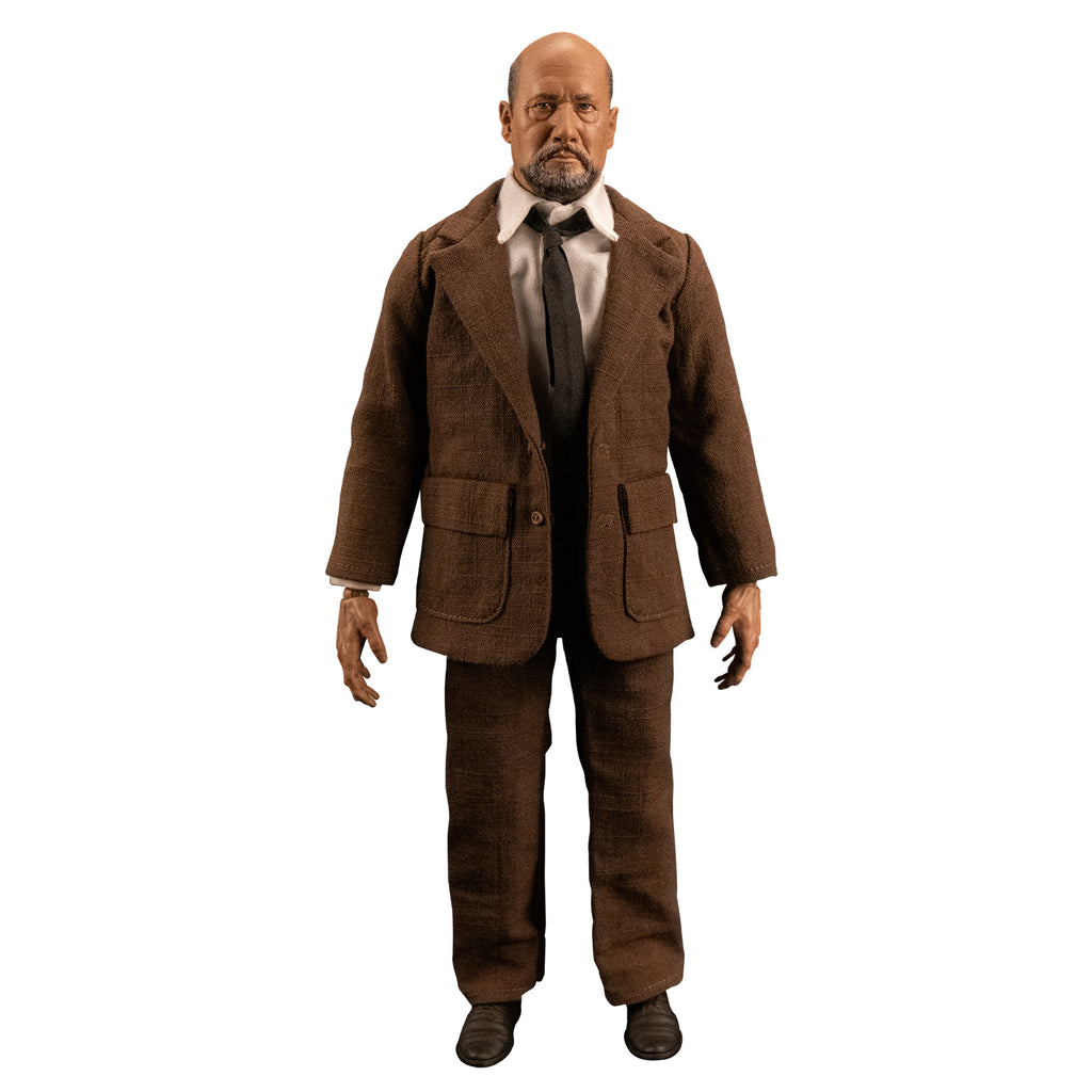 White background. Full front view of Dr. Loomis figure. Bald man with beard and mustache. white shirt, black tie, brown suit coat and pants, black shoes. 