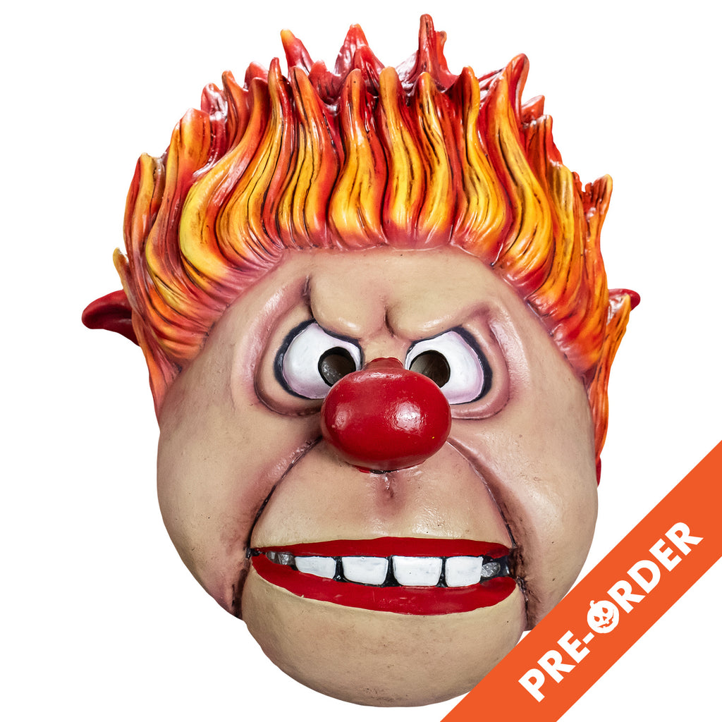 white background, orange diagonal banner bottom right, white text reads pre-order.  Mask, front view. Cartoonish, round head, Yellow orange and red flame-like spiky hair, pointy red-tipped ears, furrowed brow, no eyebrows, large cartoon eyes, round red nose, prominent jowls, wide red-lipped mouth, slightly open showing large square white teeth.