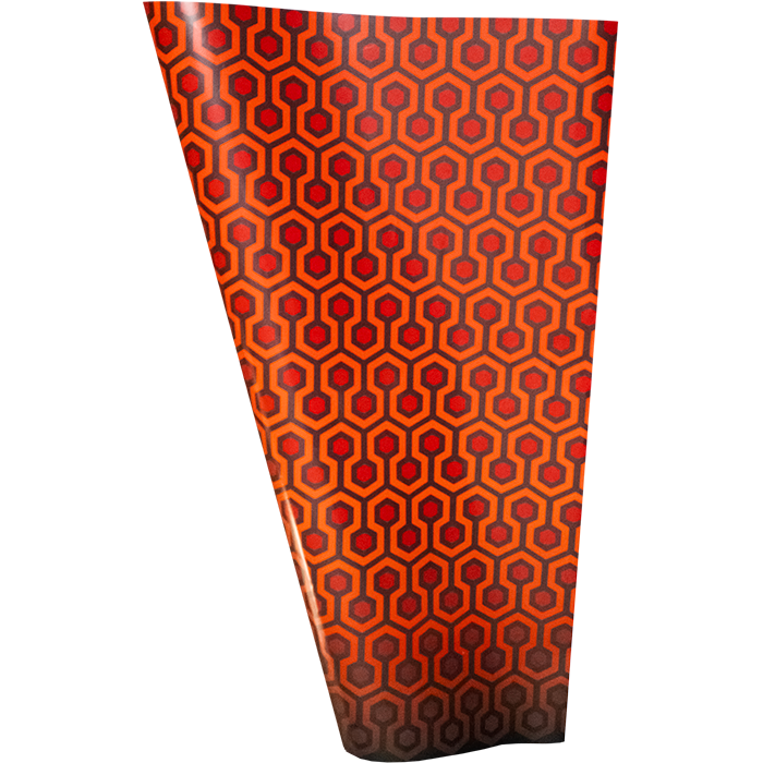 Wrapping paper.  Orange and red repeating hexagonal design.