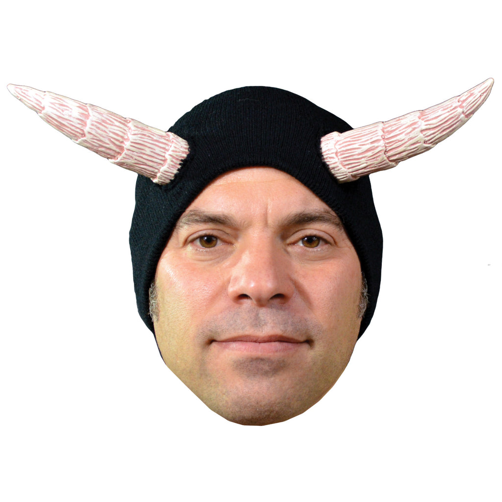 Man wearing black knit cap with sewn on white horns.