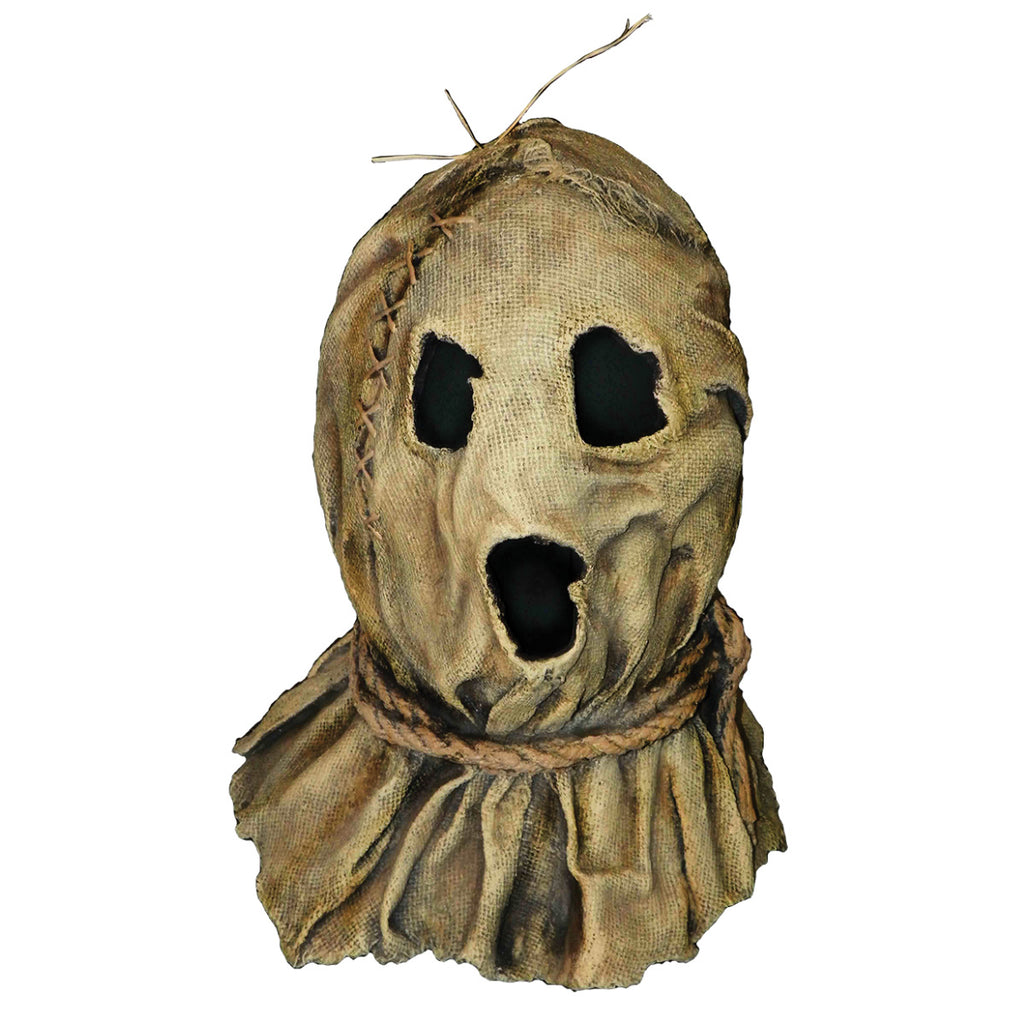 Front view. Scarecrow mask. Head and neck. Burlap sack stitched together, tied at neck with rope. Black cut out holes for eyes and mouth.