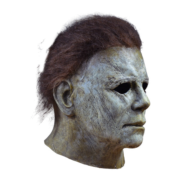 Right side view, mask, head and neck.  Aged and distressed white skin, dark brown hair.