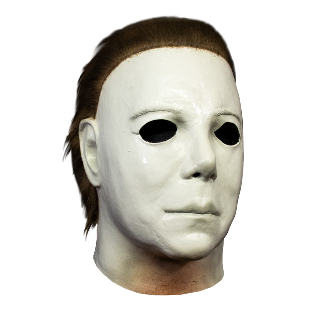 Michael Myers mask, right view. Head and neck. Dark brown hair, white skin, flesh colored around bottom of neck.
