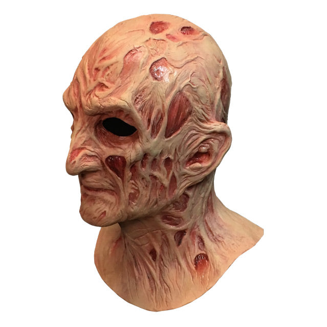 Left side view, Freddy Krueger mask, head and neck, burnt skin, wrinkled with sores and scars.