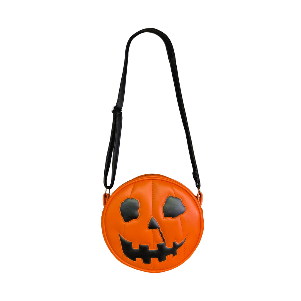 Jack o' lantern purse. Front view. Orange and black with black strap.