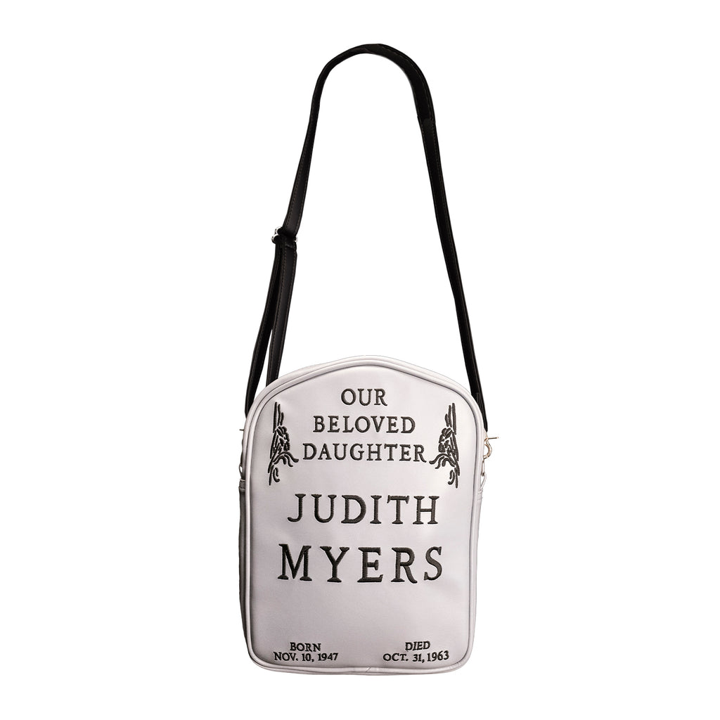 Gray Judith Myers Tombstone bag, black strap, front view, Text reads our beloved daughter Judith Myers, born Nov 30 1947, died Oct 31 1963. 