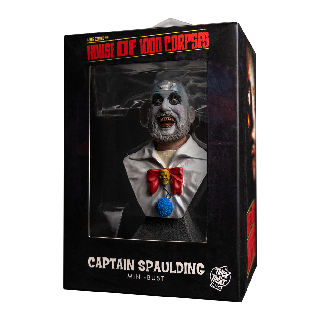 Product packaging, front. Black window box showing mini bust.  Text reads House of 1000 Corpses, Captain Spaulding, Mini Bust.  White Trick or Treat Studios logo.