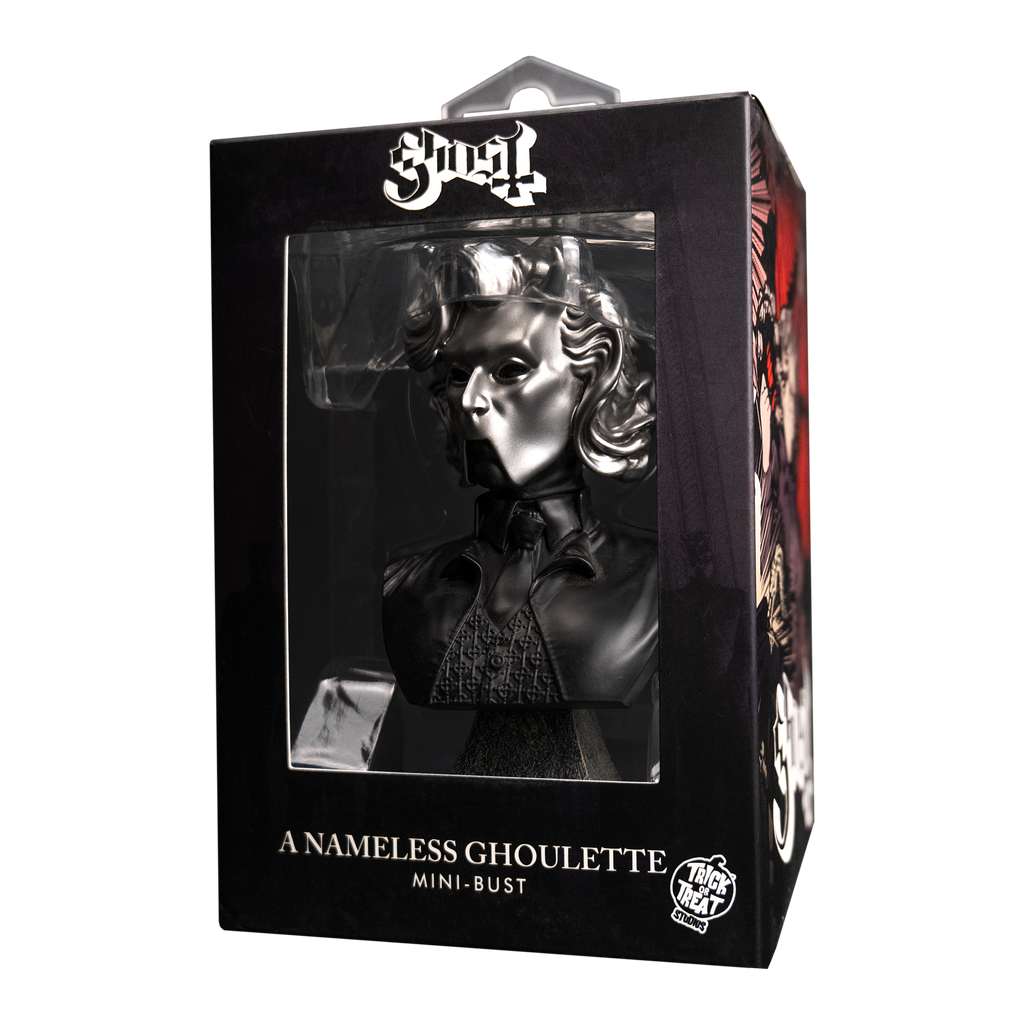 Product packaging, black window box with Ghost, Nameless Ghoulette mini bust inside. Head neck and chest of woman, wearing chrome facemask with horns on face. Black shirt, tie and vest under black jacket. Set on gray stone textured base. Text on box reads Ghost, A Nameless Ghoul mini bust. white Trick or Treat Studios logo