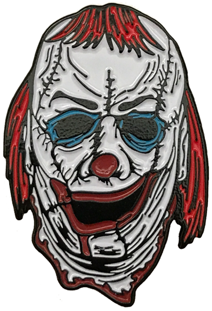 Enamel pin. Clown mask, pieces stitched together. white skin, red nose, grotesque wide red mouth, blue rings around eyes. sparse shaggy red hair on forehead and over ears.