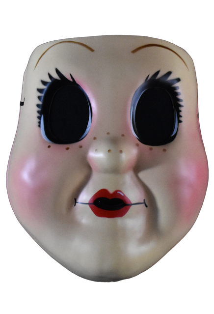 Plastic face mask, front view.  Dollface, large empty black eyes with spiky eyelashes. Thin brown eyebrows. Freckles on nose and cheeks, smiling mouth with small red lips. Plump pink cheeks.