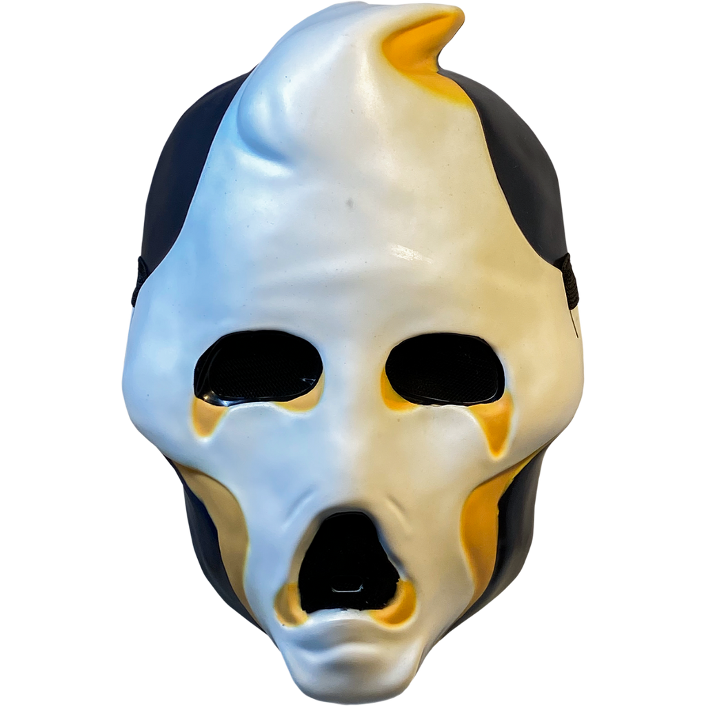 Plastic mask, front view. White ghost face, black on sides of head and jaw. Black eyes and open moaning mouth. Yellow at tip of pointed head, around bottom of eyes and mouth and below cheeks. 