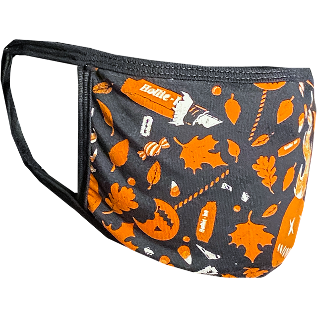 PPE mask, right side view, printed with orange and white images of flaming jack o' lantern, fall leaves and candy on black background.