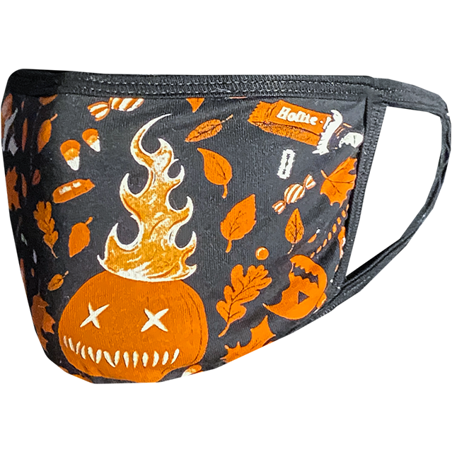PPE mask, left side view, printed with orange and white images of flaming jack o' lantern, fall leaves and candy on black background.