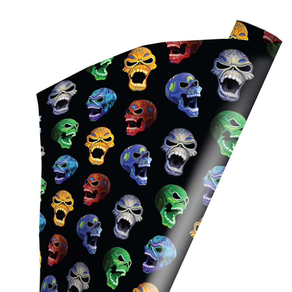 Wrapping paper with repeating pattern of multicolored Eddie skull illustrations.