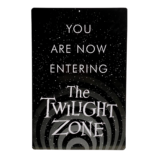 Metal sign, portrait orientation.  Black and white. Stars and gray concentric circles in background.  White text reads You are now entering the Twilight Zone.