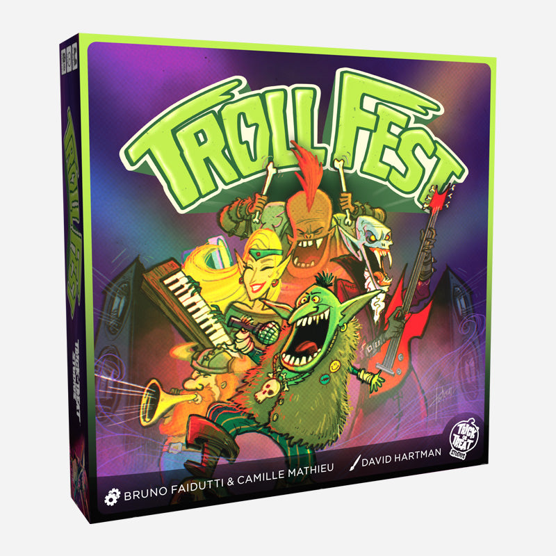 Game box, front.  Illustration of creatures playing instruments on a purple background.  Text reads Troll Fest, Bruno Faidutti and Camille Mathieu, David Hartman.  White Trick or Treat Studios logo bottom right corner.
