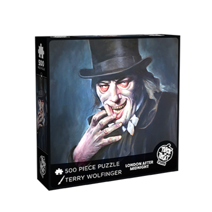 product box, front.  illustration of a man in a black top hat, long gray hair, pale wrinkled skin, red circles around eyes, mouth open in a grin, right hand at mouth, fingers on bottom lip. wearing a black overcoat, black and gray background. white text below reads 500 piece puzzle, Terry Wolfinger, London After Midnight. white trick or Treat Studios logo bottom right 