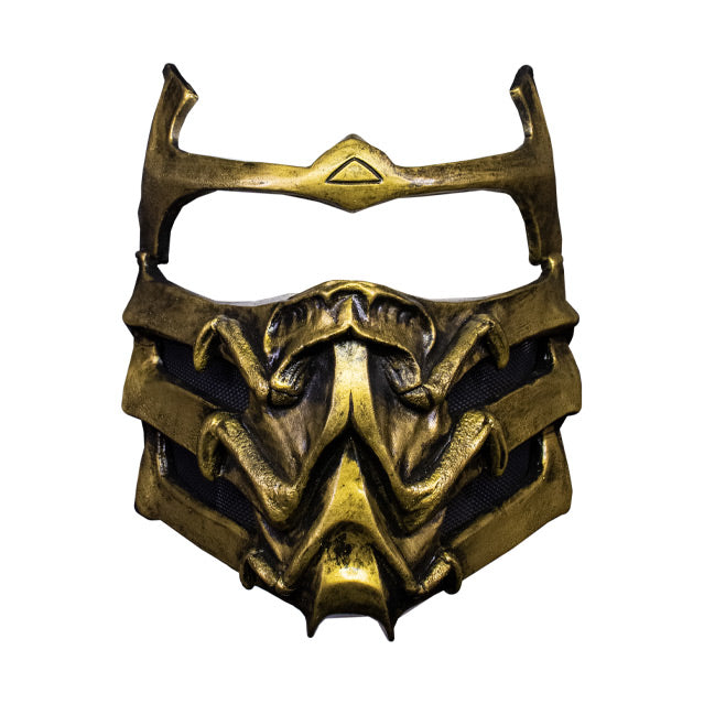 Plastic face mask, front view.  Gold and black, covers lower face and across brows.
