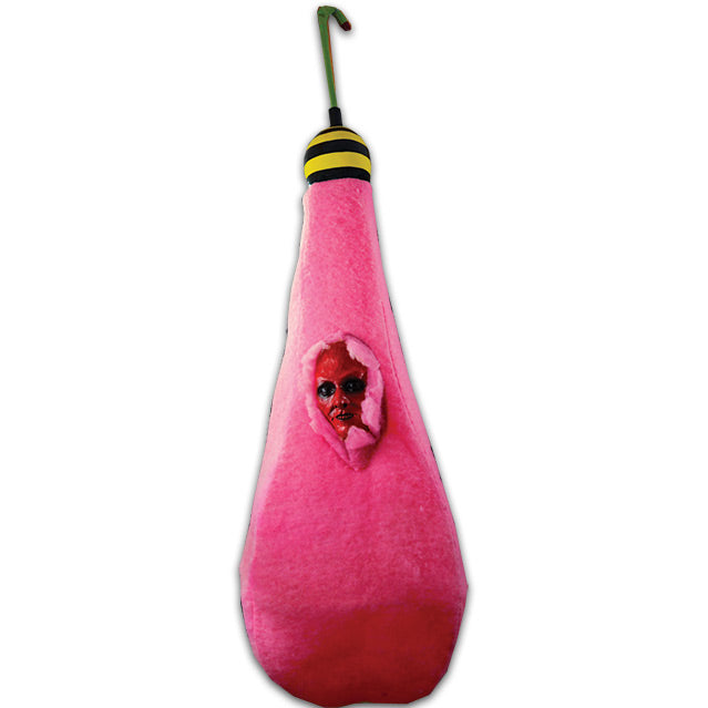 Hanging prop.  Pink, cotton candy-like sack with human face showing in the middle, yellow and black striped ball with hanging hook.