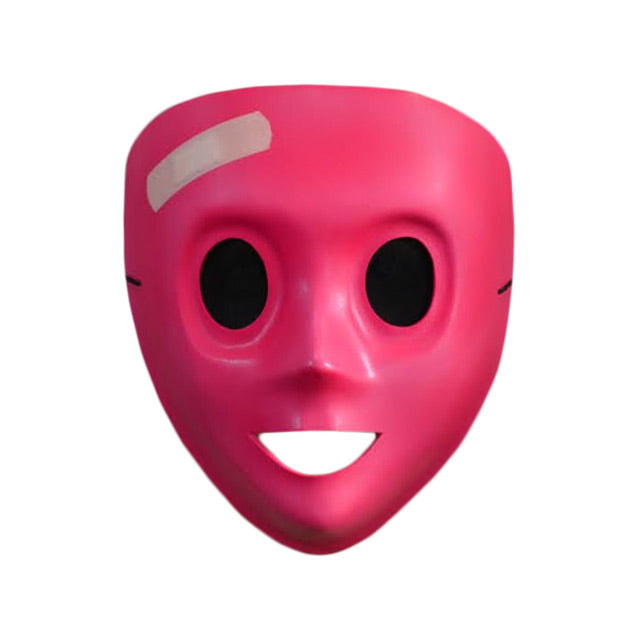 Plastic face mask.  Bright pink, nondescript face, large black eyes, adhesive bandage on right side of forehead.