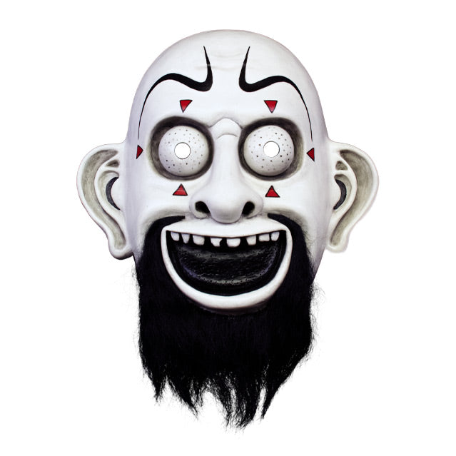 Vacuform plastic face mask, front view. Bald clown-like face, exaggerated drawn black eyebrows, small red triangles around large white eyes, large ears, Black grinnig mouth showing top teeth, full black beard