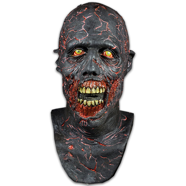 Mask, head, neck and upper chest.  Charred black flesh, cracked showing red underneath.  Bloodshot, yellow-green eyes.  Red flesh around open mouth, missing lips, showing red gums and dirty yellowed teeth.