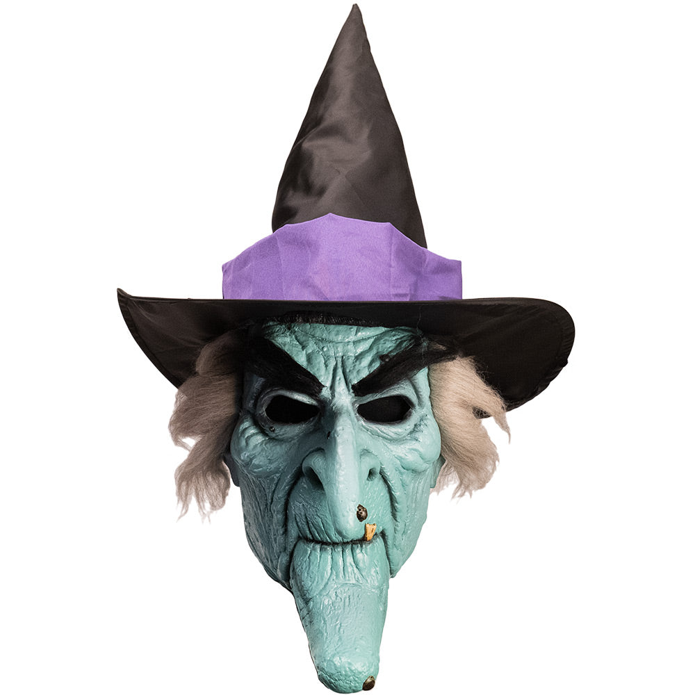 Mask, front view.  Pale green witch face with elongated chin, bushy black eyebrows and warts, gray hair, wearing black witch hat with purple band.
