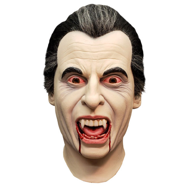 Mask, front view, head and neck.  Vampire, pale skin, black and gray hair, bloodshot eyes, vampire fangs, mouth open, blood dripping from both sides of mouth.