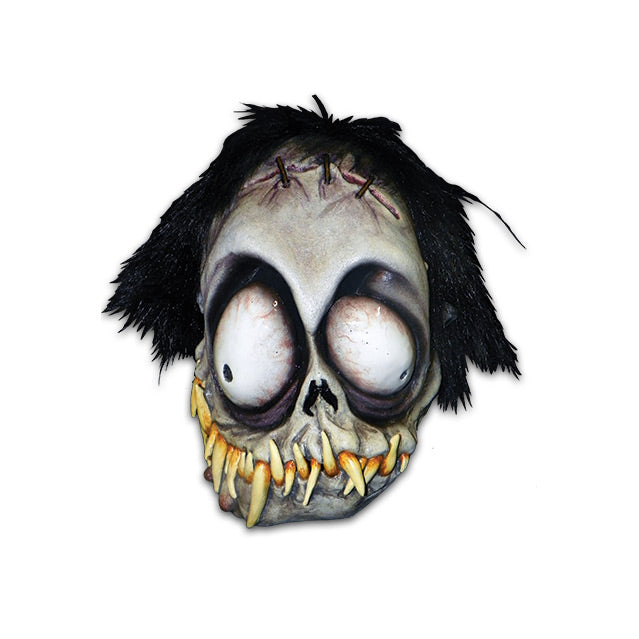 Mask.  Black shaggy hair.  White flesh stitched at top of forehead, deformed skull-like face.  Black rimmed large bloodshot white eyes with small pupils, wide crooked mouth full of sharp yellowed teeth.