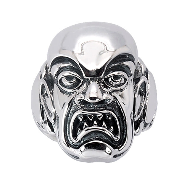 Sterling silver ring, overhead front view. Rob Zombie, Phantom Creep face, grimacing man with sharp teeth.