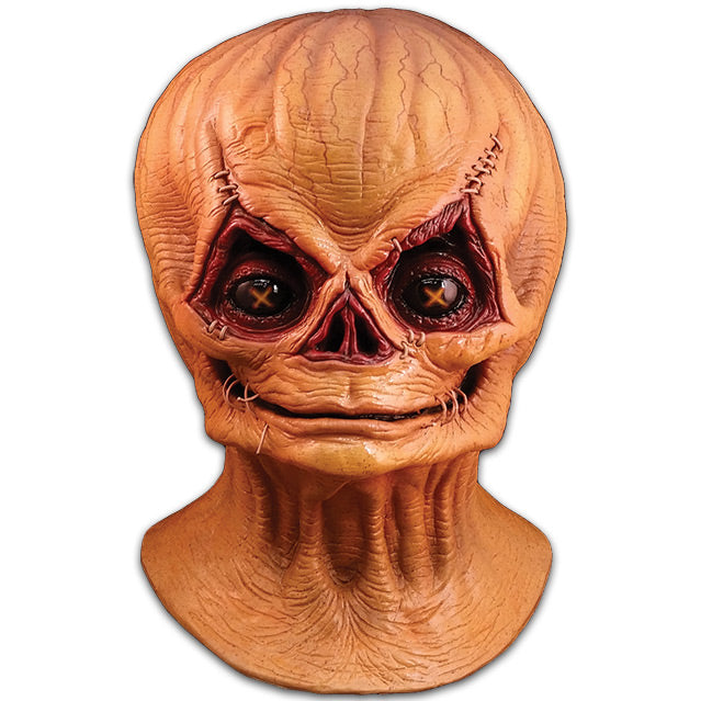 Mask, head neck and upper chest.  Sam Unmasked head. Orange skull-like jack o' lantern face, stitches above eyes and sides of closed mouth.