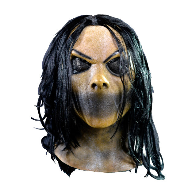 Mask, head and neck, front view.  Long black hair.  Black thin eyebrows. Black closed eyes.  No mouth, flat black skin where mouth would be. Discolored flesh on neck and upper chest..