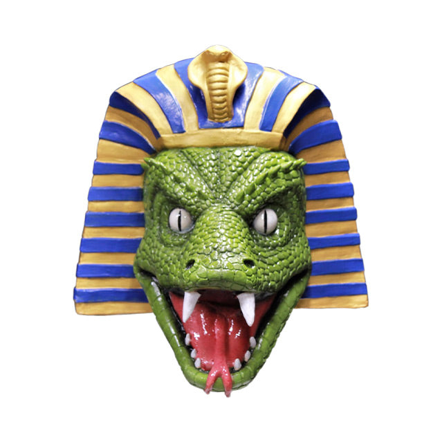 Mask.  Green Snake face, white eyes. Mouth wide open showing forked tongue, two large fangs and several small sharp white teeth.  Wearing Egyptian gold and blue head piece with gold cobra at the top.