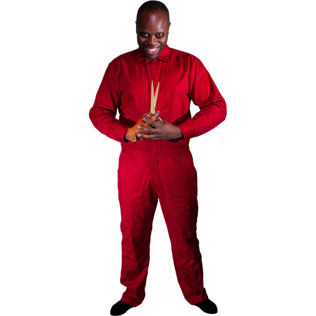 Costume. Man in red coveralls, holding gold scissors.