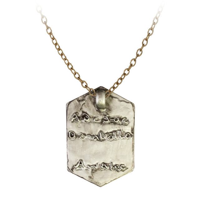 Heart of Damballa amulet prop, back.  Silver, hexagonal pendant, gold chain.