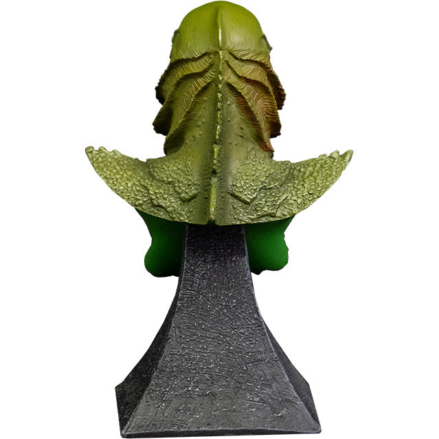 Mini bust, back view. Head, shoulders and upper chest of green scaly fish-man, ridge and fins down center of head and spine. Set on gray stone textured base.