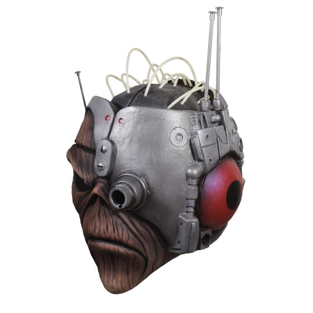 Mask, left side view. Eddie black right eye, silver space helmet with wires and antennae, covering head and left eye, red headset.