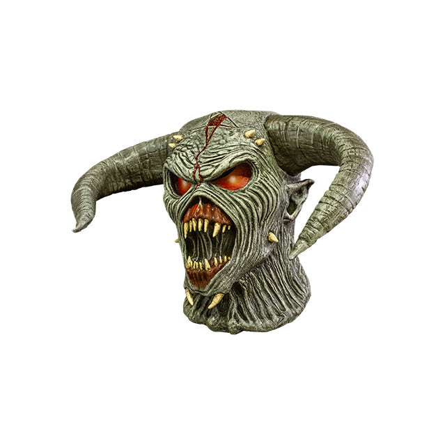 Mask, head and neck, left side view. Iron Maiden Eddie demon. Red eyes, large curved horns, pointed ears, wide open mouth with large sharp teeth.