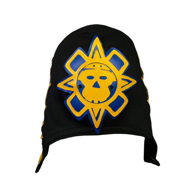 Back view. Black cloth mask with blue and yellow sewn on embellishments.