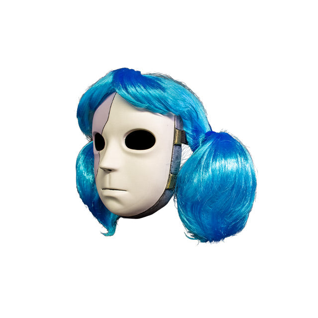 Plastic Mask, left side view.  Gray and white face, blank expression, large black eyes. Blue wig in two ponytails.  Gray and gold band around border of mask.