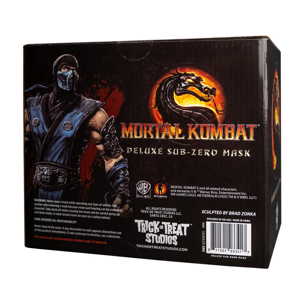Product packaging, back. Black box, showing illustration of Mortal Kombat Sub-zero character. Text reads Mortal Kombat, Deluxe Sub-zero Mask. Manufacturing and licensing information.