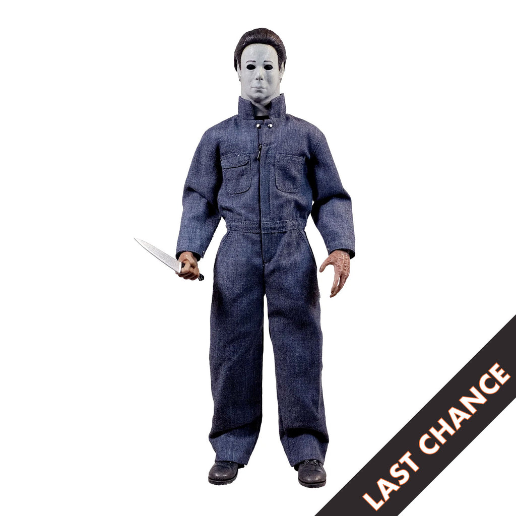 white background, black diagonal banner, bottom right corner, white text reads last chance.  Front view. Halloween 4 Michael Myers 12" figure. White mask brown hair, wearing blue coveralls, black boots, holding butcher knife in right hand.